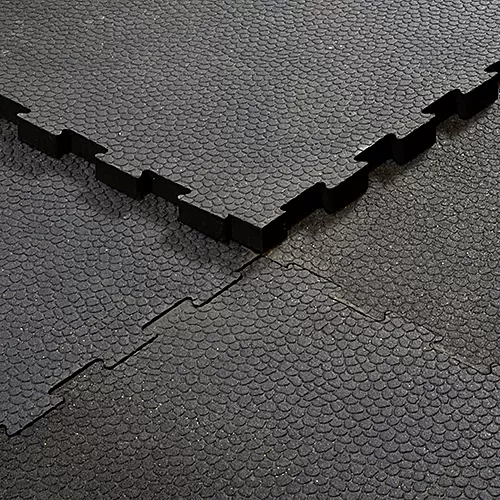 Close-up of Haseen interlocking rubber gym flooring tiles puzzle edges — anti-slip waterproof gym tiles Pakistan